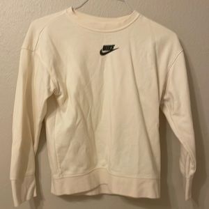 Light yellow sweatshirt from Nike has no stains barely worn